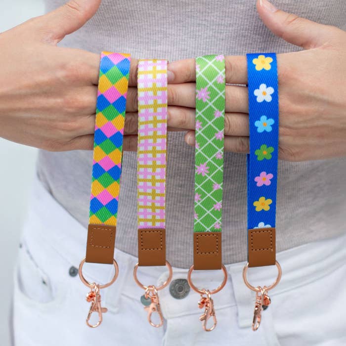 Splosh teacher fabric wristlet keychains in four colourful designs