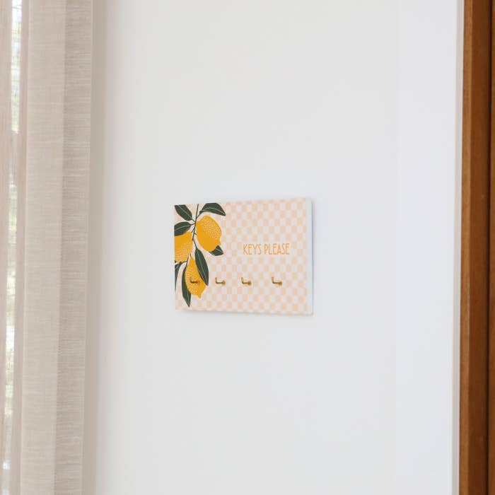 Tuscan Sun Key Hanger by Splosh hanging on a wall