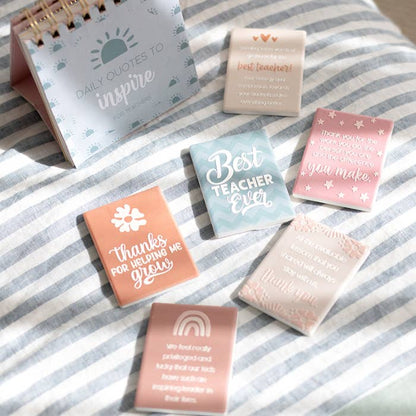 Splosh teacher ceramic magnets displayed together with appreciation messages