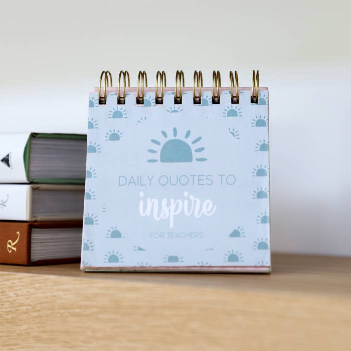 Teacher Affirmation Flip Book by Splosh displayed on a desk