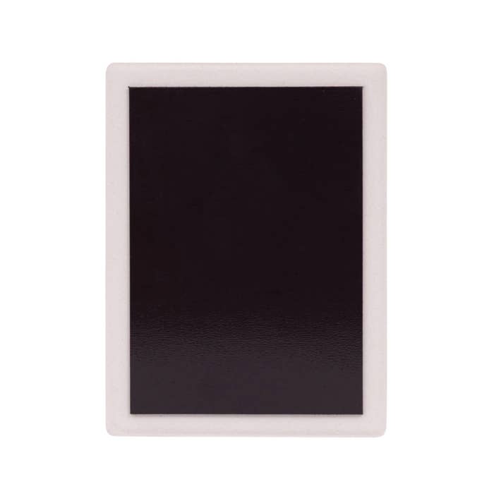 Reverse of a Splosh ceramic magnet showing the magnetic backing