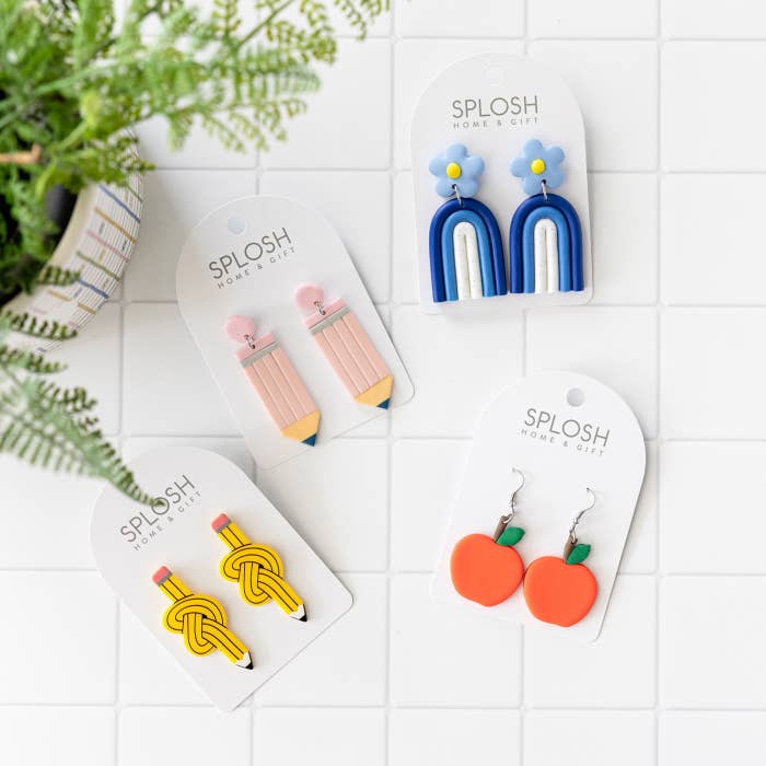 Teacher Yellow Pencil Earrings by Splosh in a styled earring collection