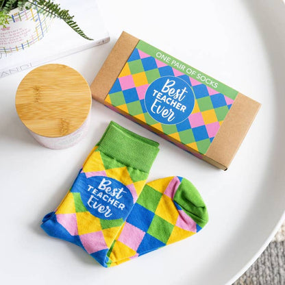 Teacher Best Teacher Socks by Splosh with the gift box in a styled display