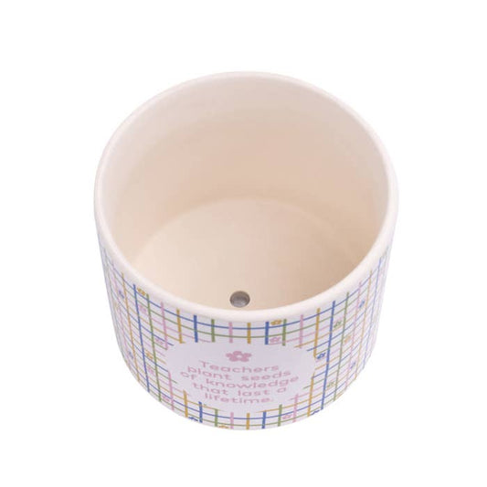 Teacher Ceramic Planter by Splosh showing the interior and drainage hole