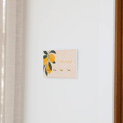 Tuscan Sun Key Hanger by Splosh hanging on a wall