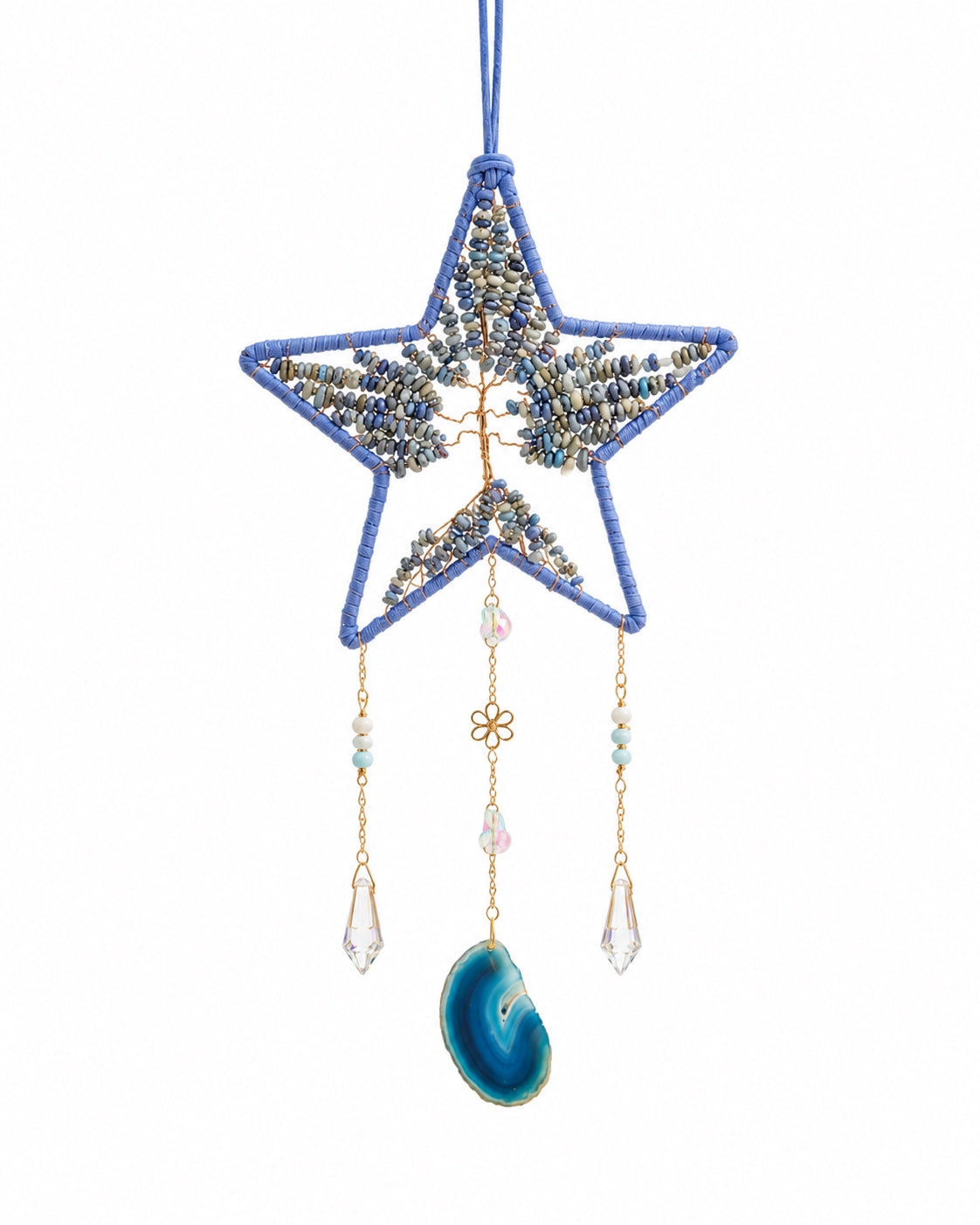 Full view of a blue star-shaped crystal dream catcher with natural gemstone chips, delicate bead strands and a hanging blue stone pendant.