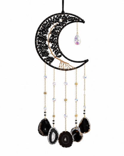 Full view of a black crescent moon crystal suncatcher with dark gemstone chips, delicate chains and natural agate pendants.