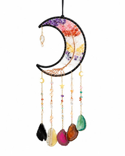 Full view of a rainbow crescent moon crystal suncatcher with multicoloured gemstone chips, bead chains and natural agate slices.