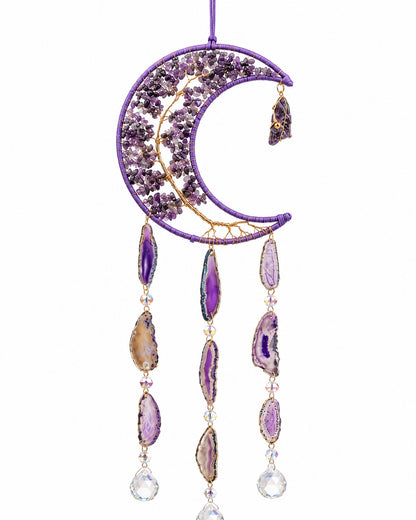 Full view of a purple crescent moon crystal suncatcher with natural gemstone chips, hanging beads and faceted rainbow prisms.