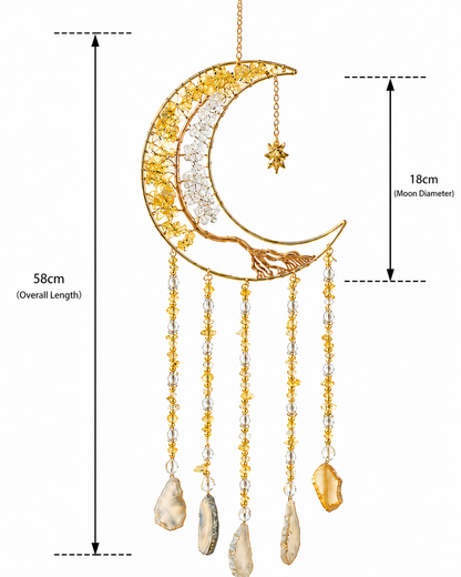 Gold crescent moon crystal dream catcher with hanging crystal beads and natural stone pendants, shown with dimension markings of 58cm overall length and 18cm moon diameter on a white background.