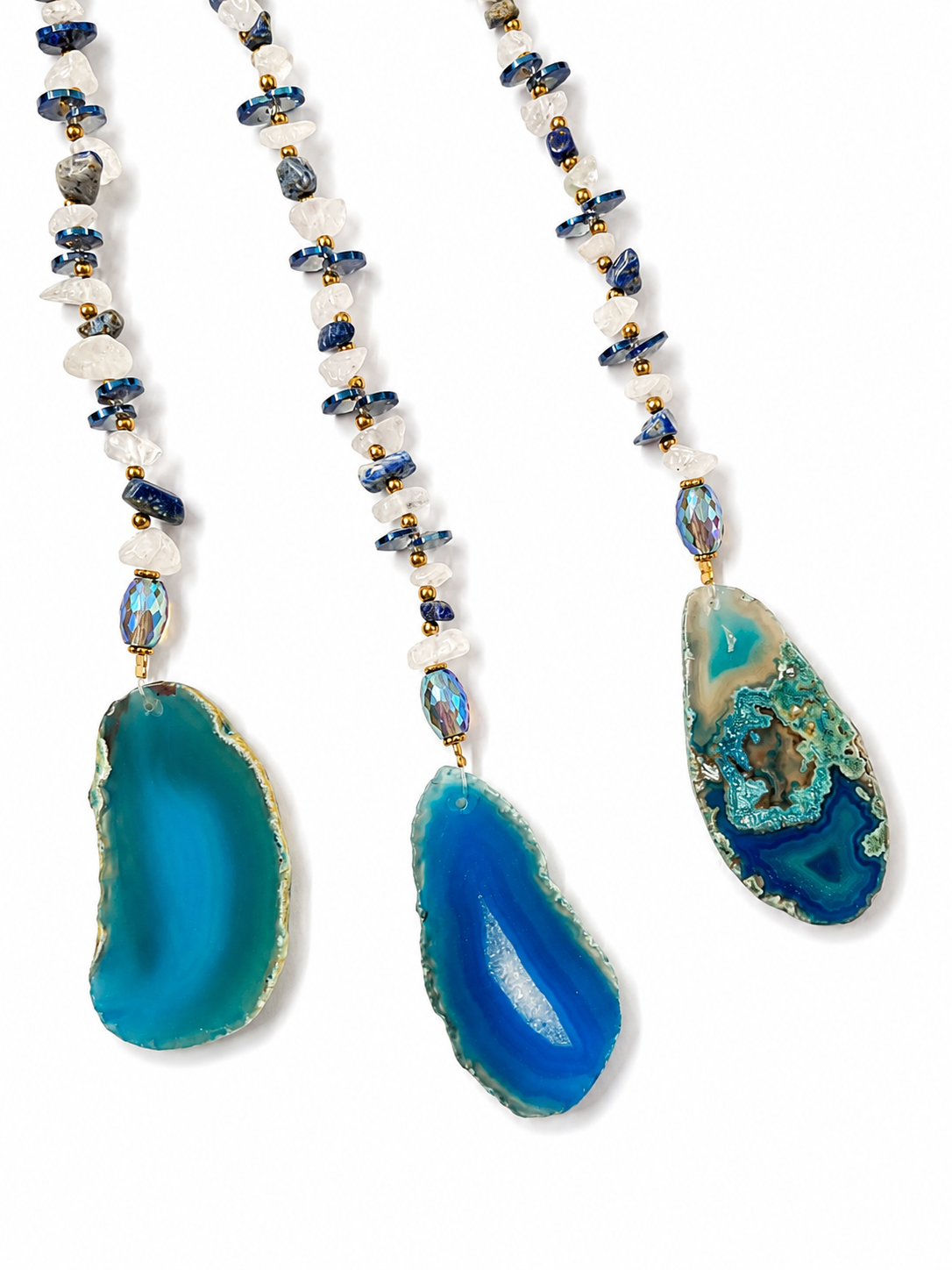 Three beaded hanging pendant with blue crystal chips and turquoise agate slice pendants, displayed against a clean white background.