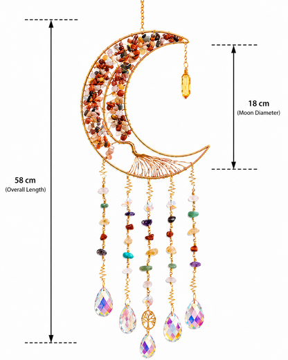 Gold crescent moon crystal suncatcher with embedded multicolor crystals and hanging beaded strands ending in iridescent teardrop charms and prism, shown with dimension labels on a white background.