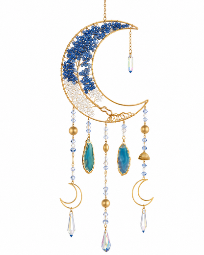 Gold crescent crystal moon suncatcher with blue and white beads, turquoise-colored stones, and dangling clear teardrop crystals on a white background.