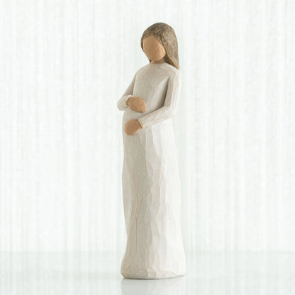 willow tree cherish Statue of a woman holding a child on a white background