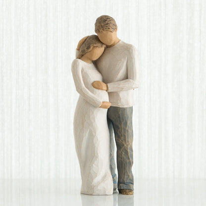 willow tree home Statue of a couple embracing on a white background